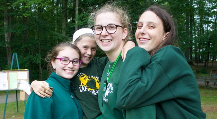 Campers and staff smiling